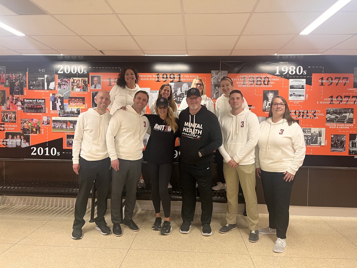 Mark and Kym Hilinski pose for a photo with the Anderson High School administrative team.